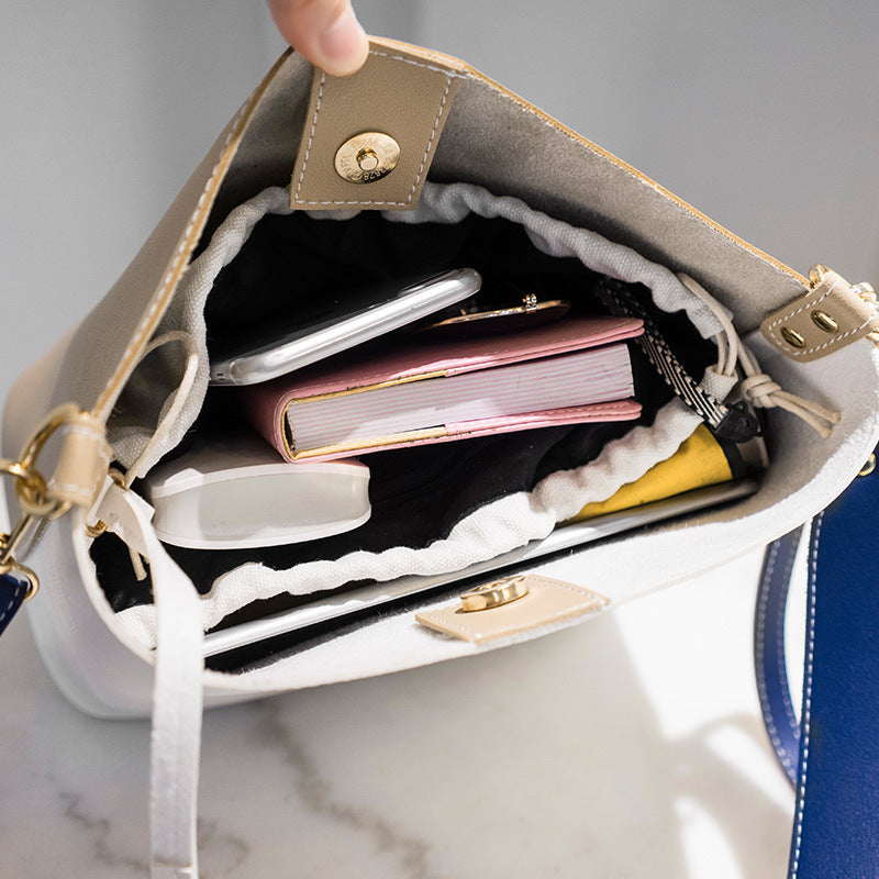 Factory direct supply 2023 new mother-in-law bag, women's bag, contrasting color bucket bag, Korean version wide shoulder strap single shoulder crossbody bag wholesale