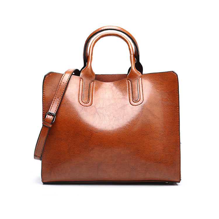 A drop-shipping women's bag 2023 new retro oil wax leather fashion tote bag simple portable one-shoulder cross-body women's bag