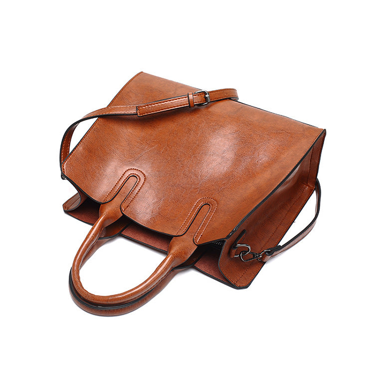 A drop-shipping women's bag 2023 new retro oil wax leather fashion tote bag simple portable one-shoulder cross-body women's bag
