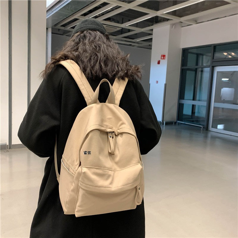 Simple and versatile solid color backpack for women's college birthday, college style school bag, female forest style middle school student trendy backpack