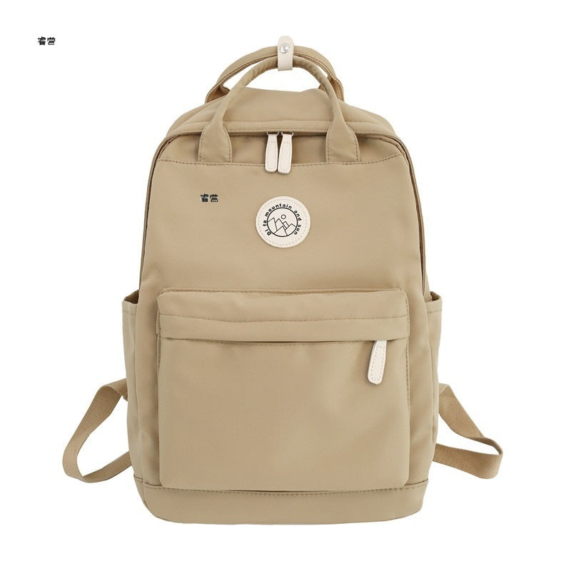 Japanese ins school bag for female middle school students 2023 new simple solid color large capacity backpack female travel backpack