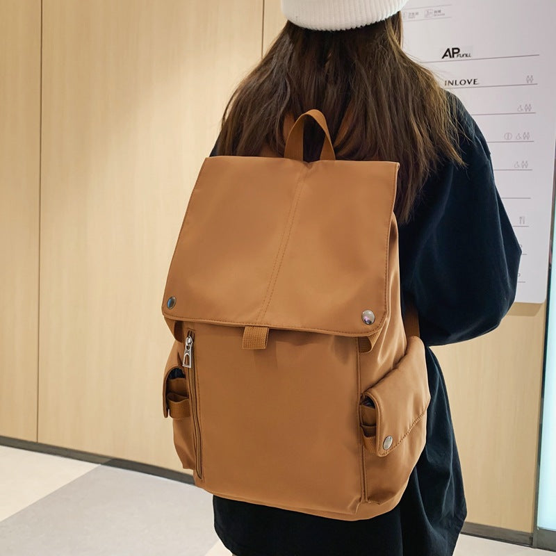 新款纯色电脑双肩包男学院风大学生翻盖书包高中生校园睿营背包女