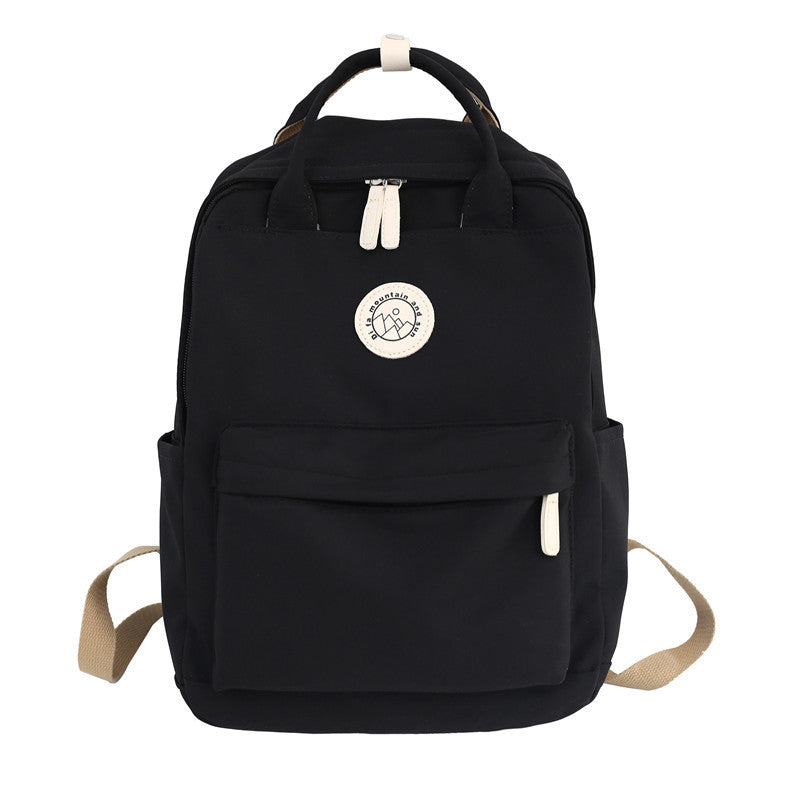 Japanese ins school bag for female middle school students 2023 new simple solid color large capacity backpack female travel backpack