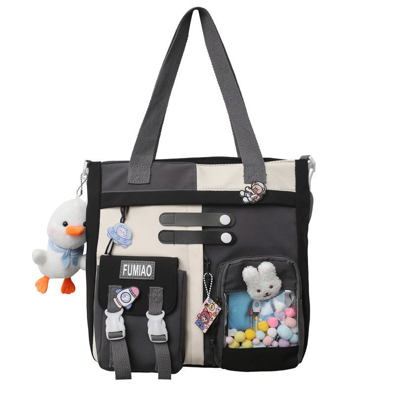 Contrast color backpack ins backpack wholesale Ruiying college student Korean style backpack large capacity middle school student schoolbag female