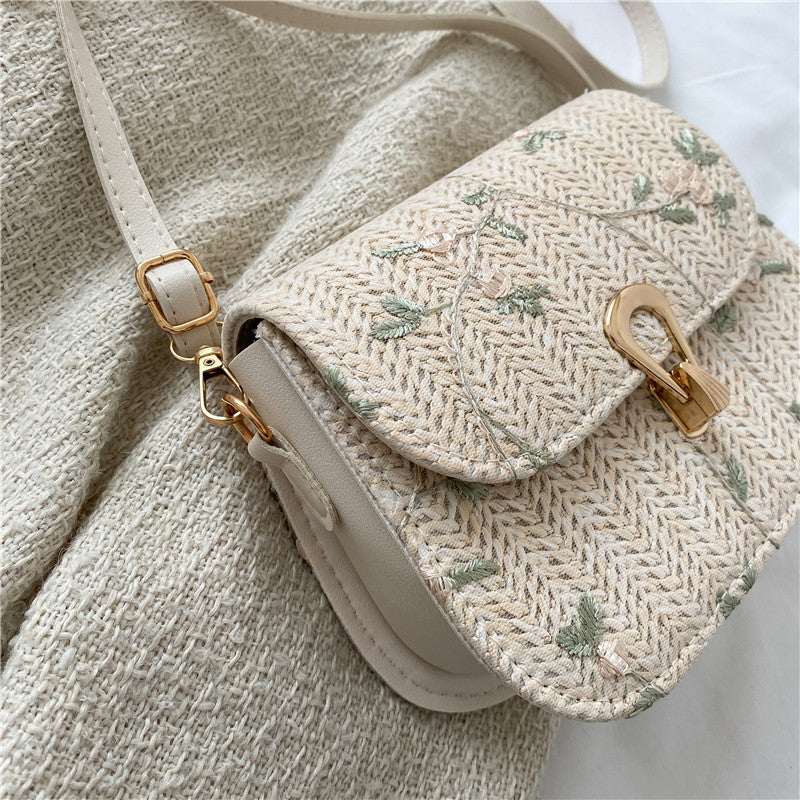 Summer straw woven bag for women 2022 new style small fresh lace flower woven saddle bag versatile single shoulder crossbody bag