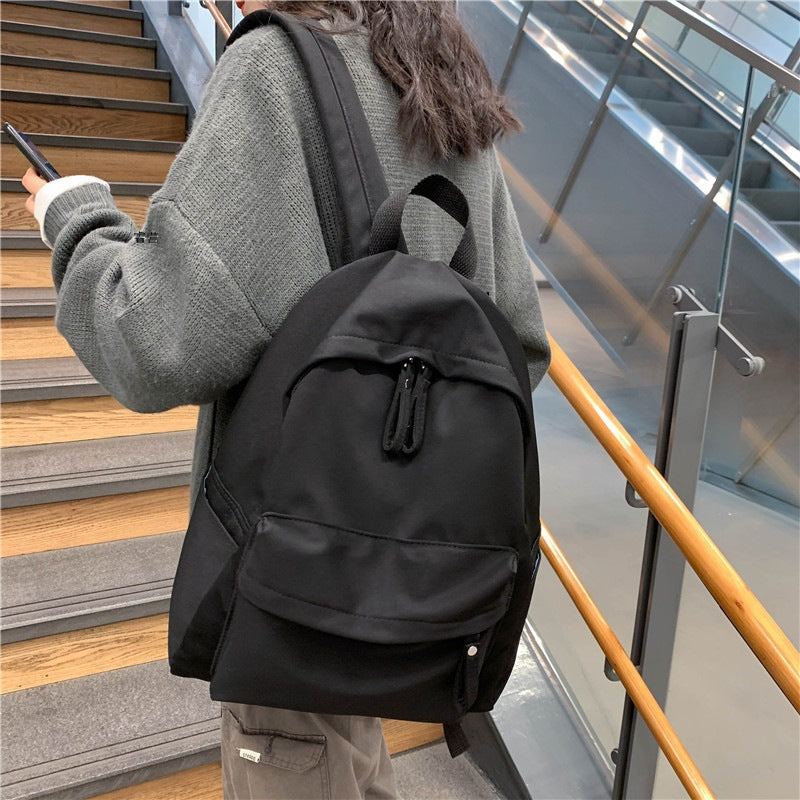 Simple and versatile solid color backpack for women's college birthday, college style school bag, female forest style middle school student trendy backpack