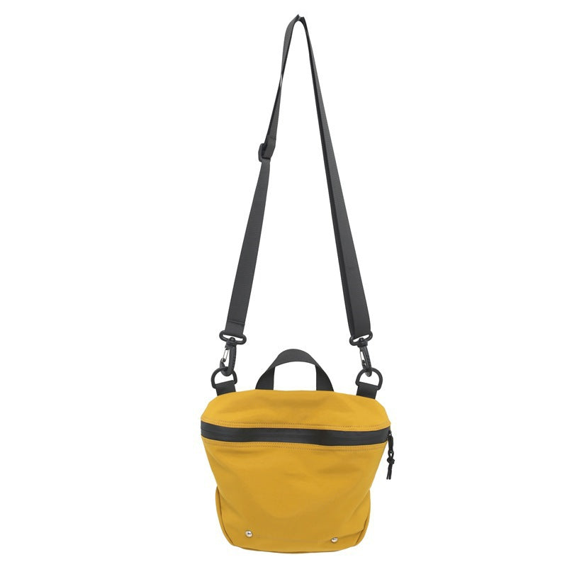Wholesale trendy brand workwear couple crossbody bag casual sports Japanese student small shoulder bag lightweight sports bucket bag