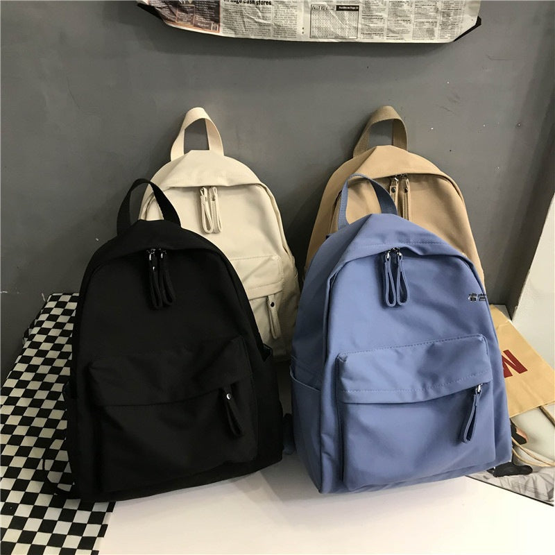 Simple and versatile solid color backpack for women's college birthday, college style school bag, female forest style middle school student trendy backpack