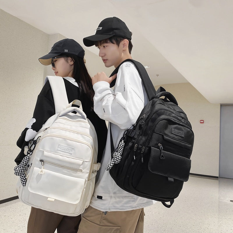 双肩包男生大容量百搭旅行睿营背包初中高中大学生简约新款书包女
