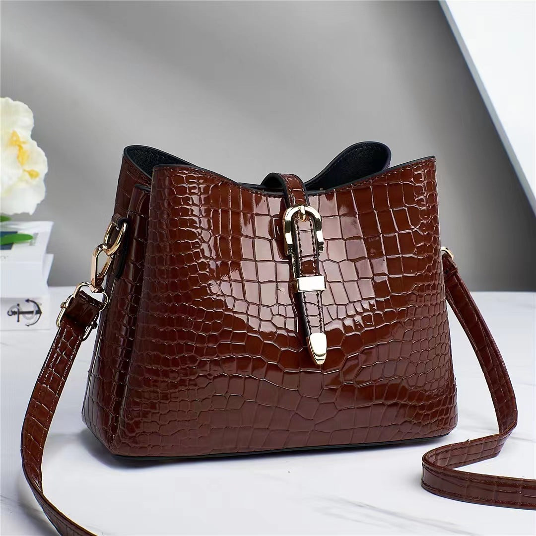 Factory bag 2022 new women's bag European and American cross-border trend texture bright leather stone pattern one-shoulder cross-body bucket bag