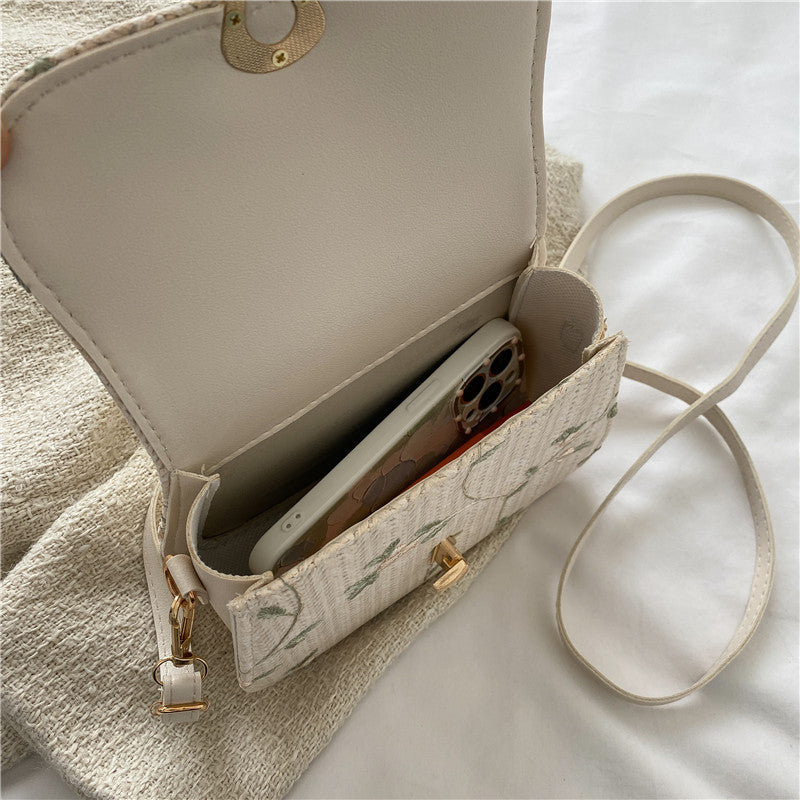 Summer straw woven bag for women 2022 new style small fresh lace flower woven saddle bag versatile single shoulder crossbody bag