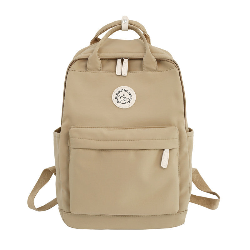 Japanese ins school bag for female middle school students 2023 new simple solid color large capacity backpack female travel backpack