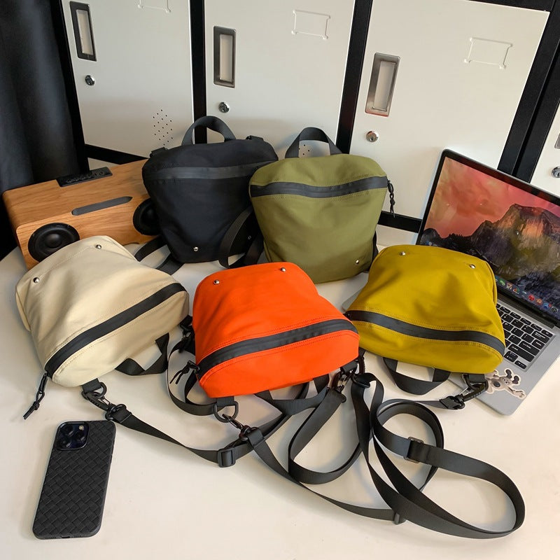 Wholesale trendy brand workwear couple crossbody bag casual sports Japanese student small shoulder bag lightweight sports bucket bag
