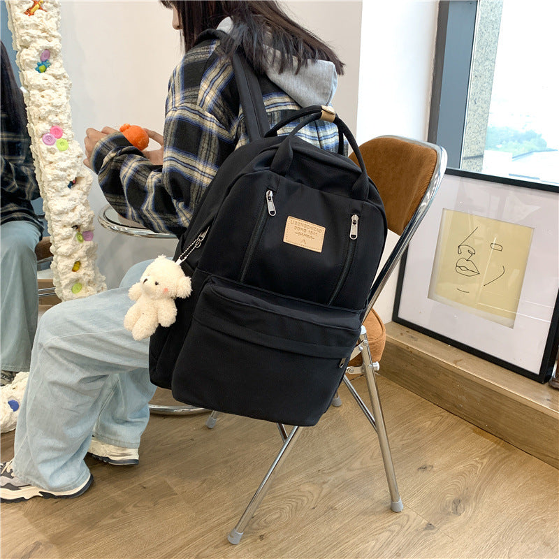 书包女初中生中学生大容量双肩包旅游大学生简约ins百搭男孩背包