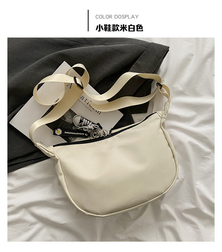 包包女2021新款秋冬潮韩版大容量斜挎包休闲轻便牛津布简约饺子包