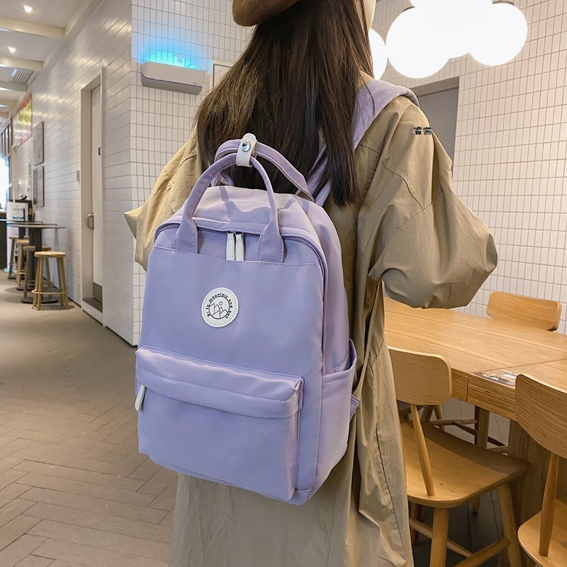 Japanese ins school bag for female middle school students 2023 new simple solid color large capacity backpack female travel backpack
