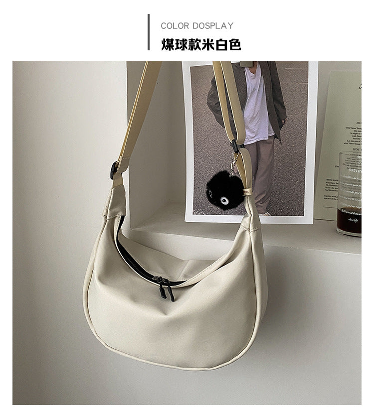 包包女2021新款秋冬潮韩版大容量斜挎包休闲轻便牛津布简约饺子包