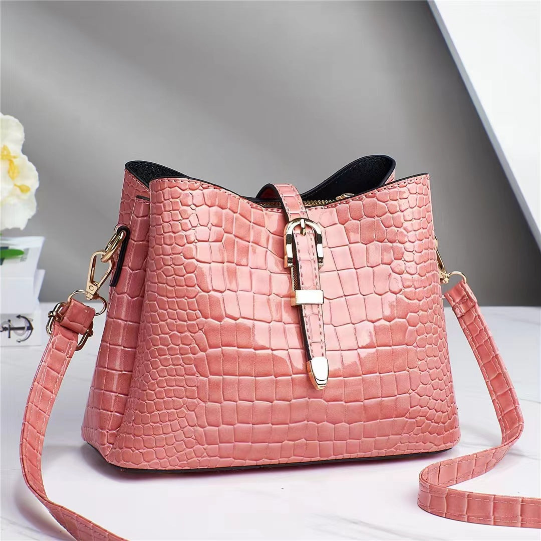 Factory bag 2022 new women's bag European and American cross-border trend texture bright leather stone pattern one-shoulder cross-body bucket bag