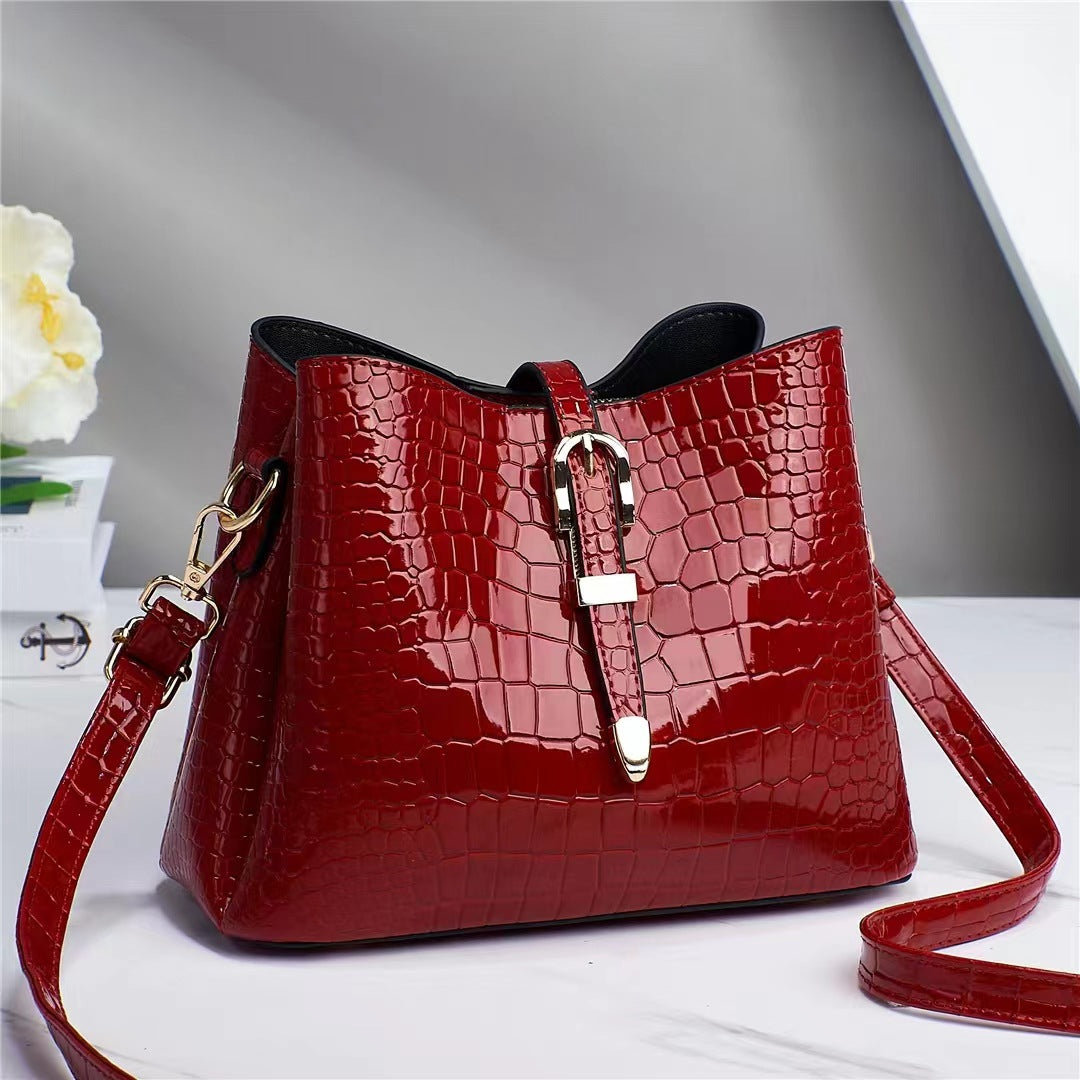 Factory bag 2022 new women's bag European and American cross-border trend texture bright leather stone pattern one-shoulder cross-body bucket bag