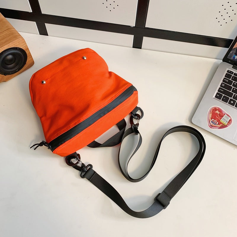 Wholesale trendy brand workwear couple crossbody bag casual sports Japanese student small shoulder bag lightweight sports bucket bag