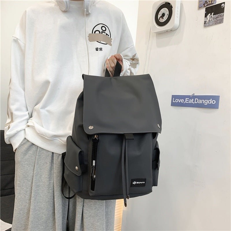 Trendy men's and women's backpacks wholesale water-repellent motorcycle large capacity large cover student school bag new backpack