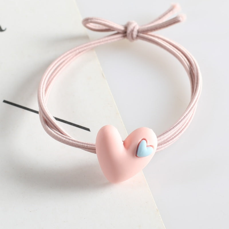 Korean version of popular peach heart milk tea color head rope female hair rope tie hair adult student hair ring heart-shaped rubber band headdress