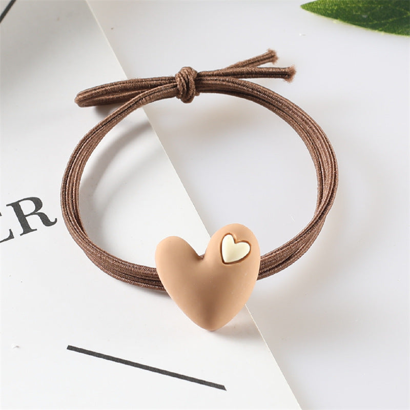 Korean version of popular peach heart milk tea color head rope female hair rope tie hair adult student hair ring heart-shaped rubber band headdress