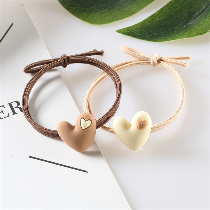 Korean version of popular peach heart milk tea color head rope female hair rope tie hair adult student hair ring heart-shaped rubber band headdress