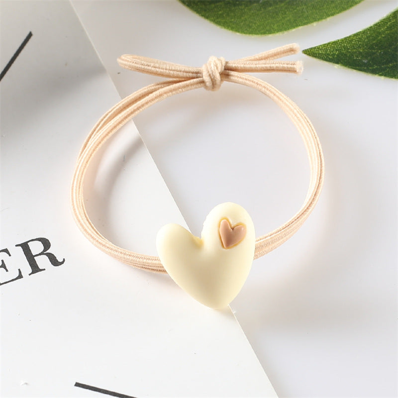 Korean version of popular peach heart milk tea color head rope female hair rope tie hair adult student hair ring heart-shaped rubber band headdress