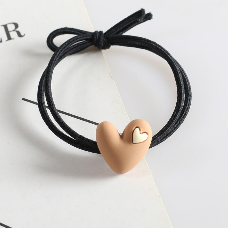 Korean version of popular peach heart milk tea color head rope female hair rope tie hair adult student hair ring heart-shaped rubber band headdress