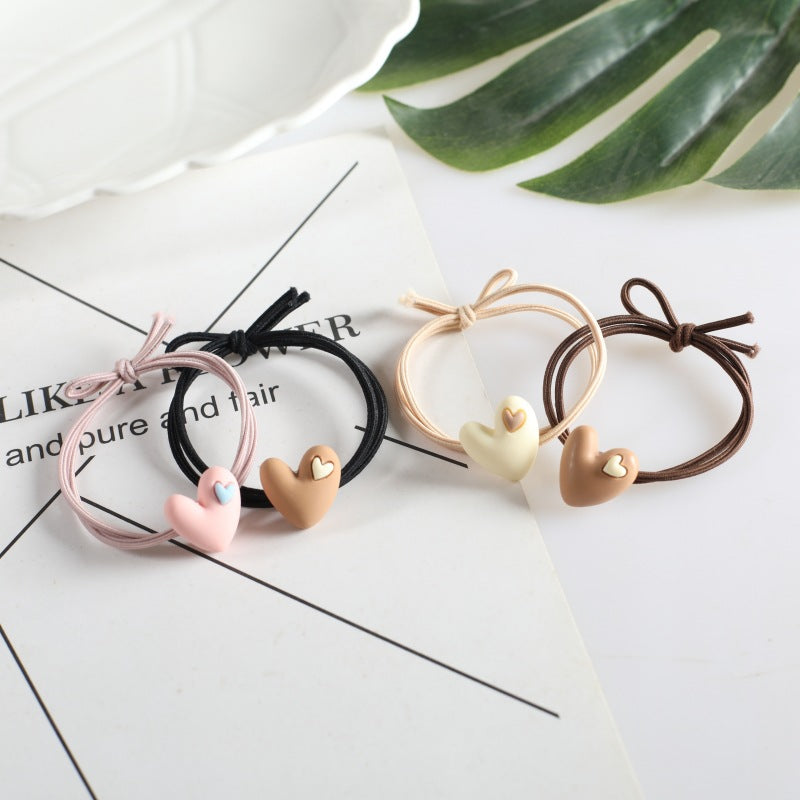 Korean version of popular peach heart milk tea color head rope female hair rope tie hair adult student hair ring heart-shaped rubber band headdress