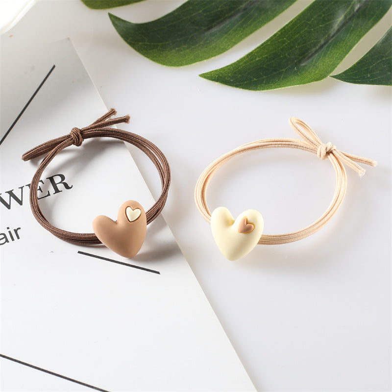 Korean version of popular peach heart milk tea color head rope female hair rope tie hair adult student hair ring heart-shaped rubber band headdress