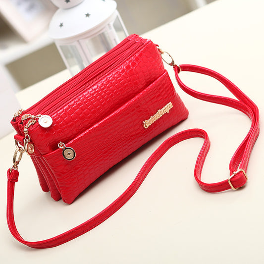 New 2023 women's bag Korean style summer trendy portable one-shoulder cross-body women's bag crocodile pattern clutch bag three-compartment small bag 