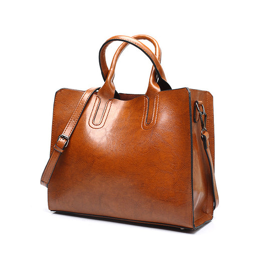 A drop-shipping women's bag 2023 new retro oil wax leather fashion tote bag simple portable one-shoulder cross-body women's bag 