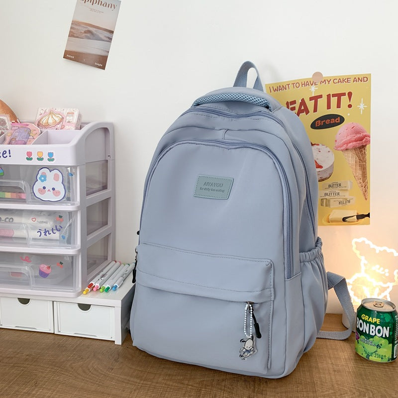 Solid color backpack for women 2023 new style middle school girl girl large capacity high school bag college girl simple backpack 