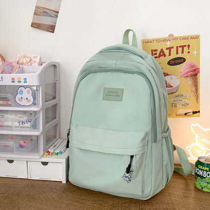 Solid color backpack for women 2023 new style middle school girl girl large capacity high school bag college girl simple backpack 