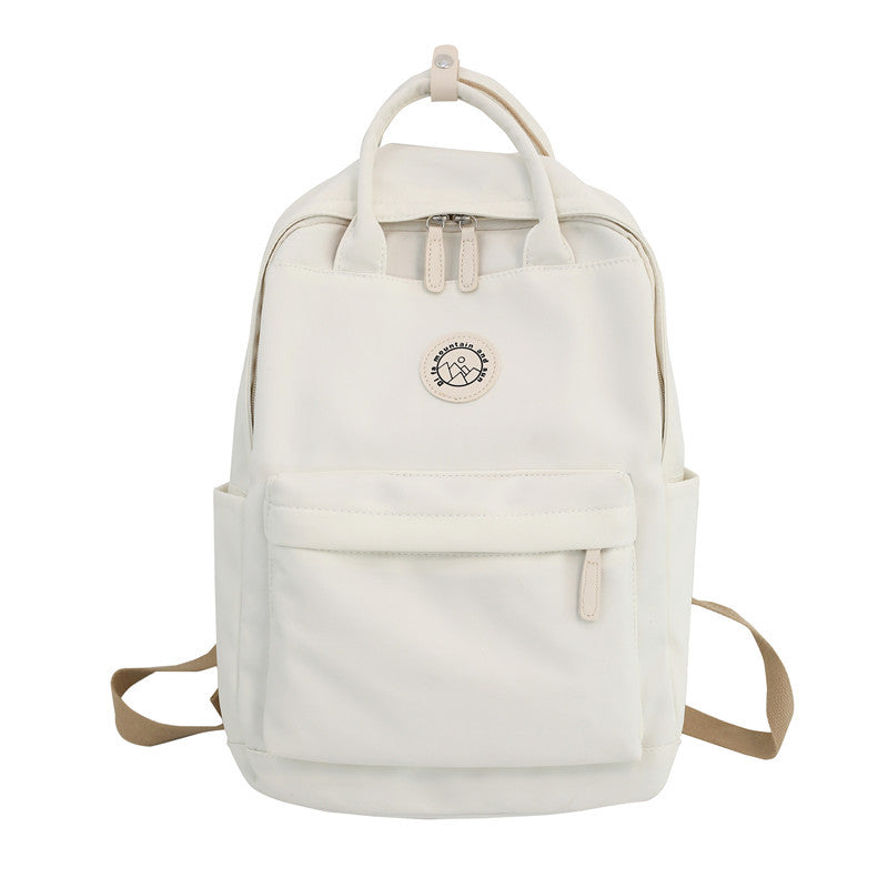 Japanese ins school bag for female middle school students 2023 new simple solid color large capacity backpack female travel backpack 