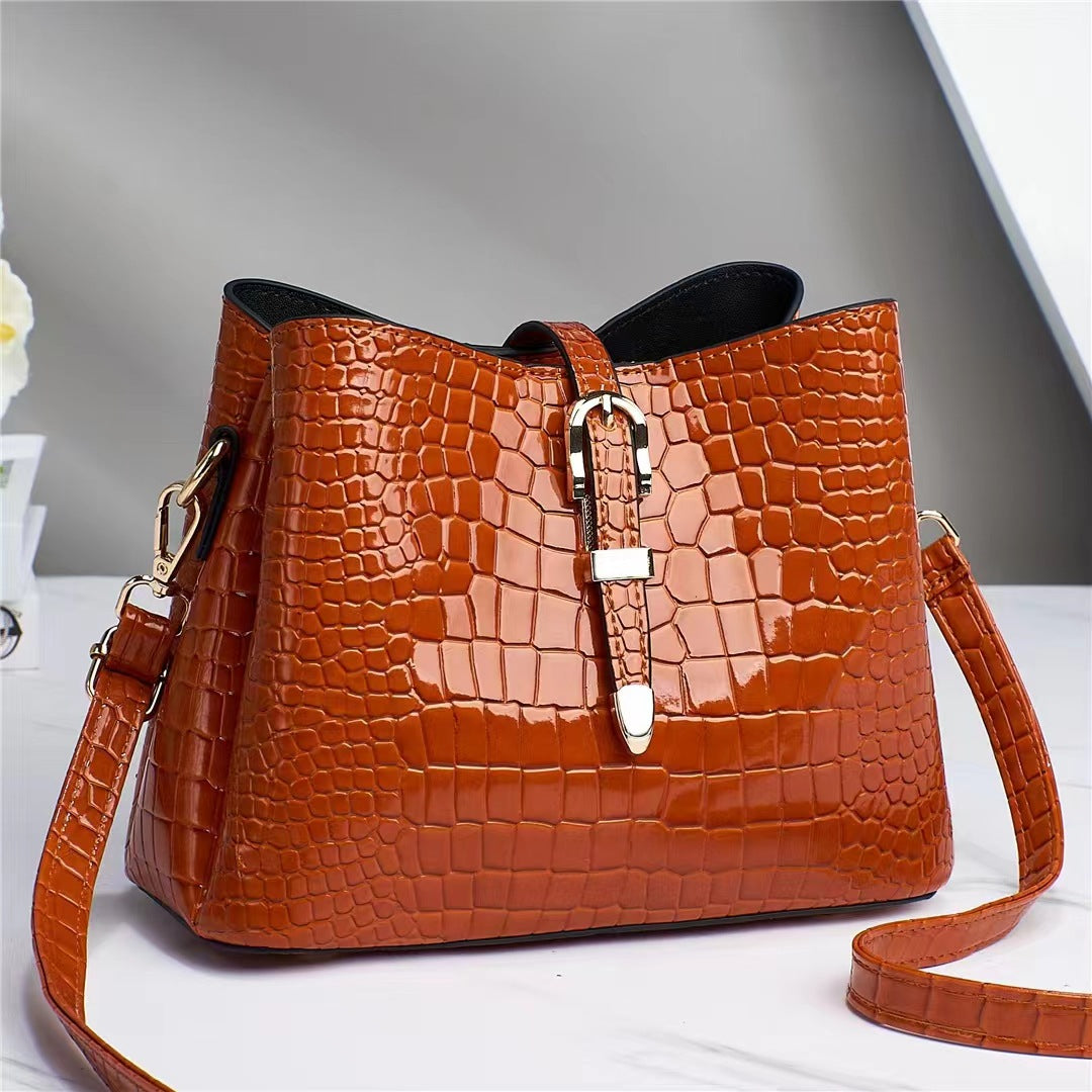 Factory bag 2022 new women's bag European and American cross-border trend texture bright leather stone pattern one-shoulder cross-body bucket bag 