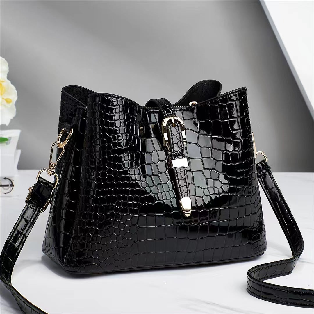 Factory bag 2022 new women's bag European and American cross-border trend texture bright leather stone pattern one-shoulder cross-body bucket bag 