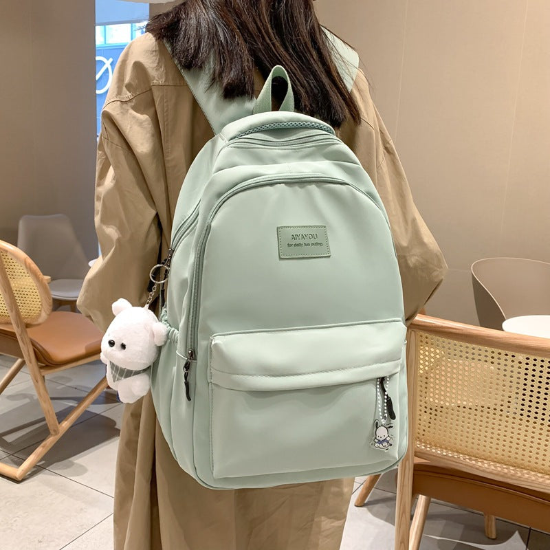 Solid color backpack for women 2023 new style middle school girl girl large capacity high school bag college girl simple backpack 