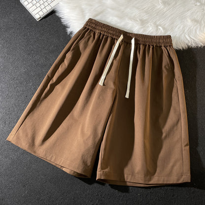 Summer new men's Korean version loose thin section breathable elastic solid color sports leisure five-point pants trendy couple shorts 