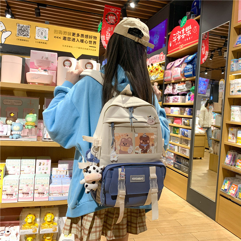 Ins style large capacity high school student schoolbag female Korean version Harajuku ulzzang cartoon backpack junior high school student backpack 