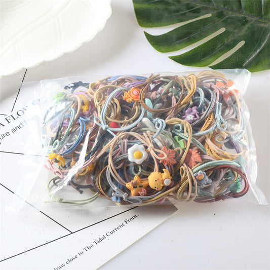 ရောစပ်စတိုင် 100pcs/အိတ် လက်ကား ကိုရီးယား ကာတွန်းဆံပင်ကြိုး မြင့်မားသော elastic ဆံပင်ခေါင်းစွပ်ကြိုးချည်ဆံပင်သားရေကွင်းဆံပင်ဆက်စပ်ပစ္စည်း
