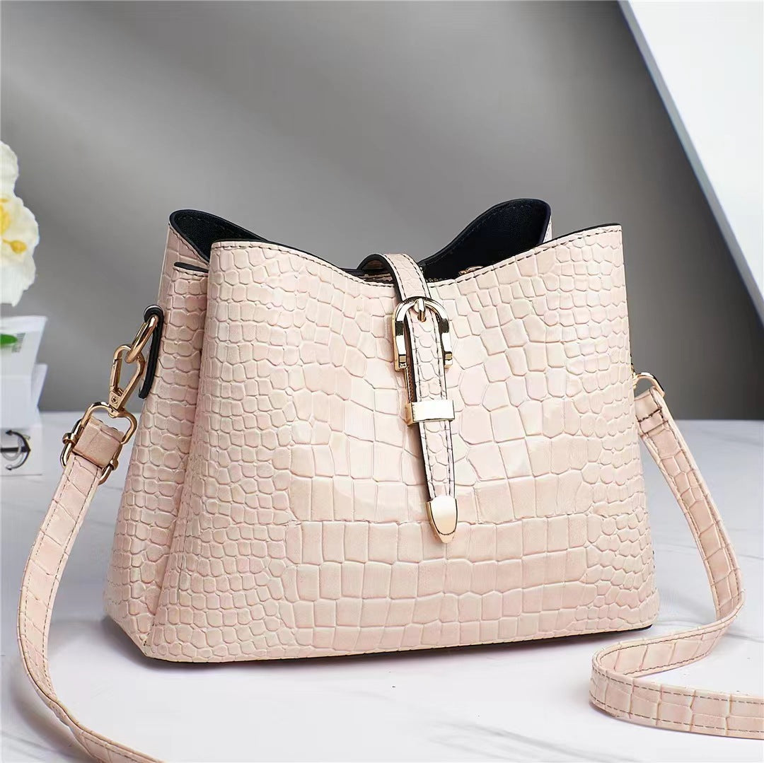 Factory bag 2022 new women's bag European and American cross-border trend texture bright leather stone pattern one-shoulder cross-body bucket bag 