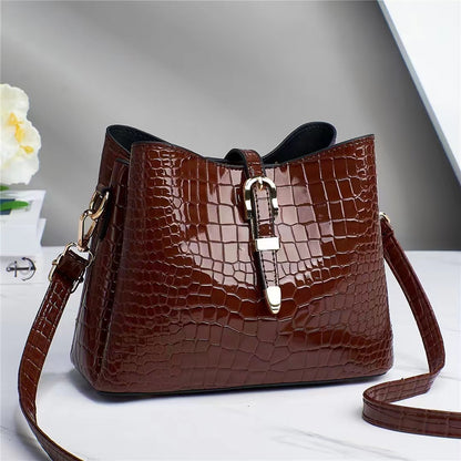 Factory bag 2022 new women's bag European and American cross-border trend texture bright leather stone pattern one-shoulder cross-body bucket bag 