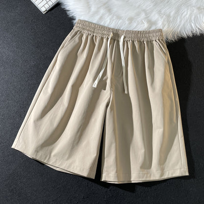 Summer new men's Korean version loose thin section breathable elastic solid color sports leisure five-point pants trendy couple shorts 