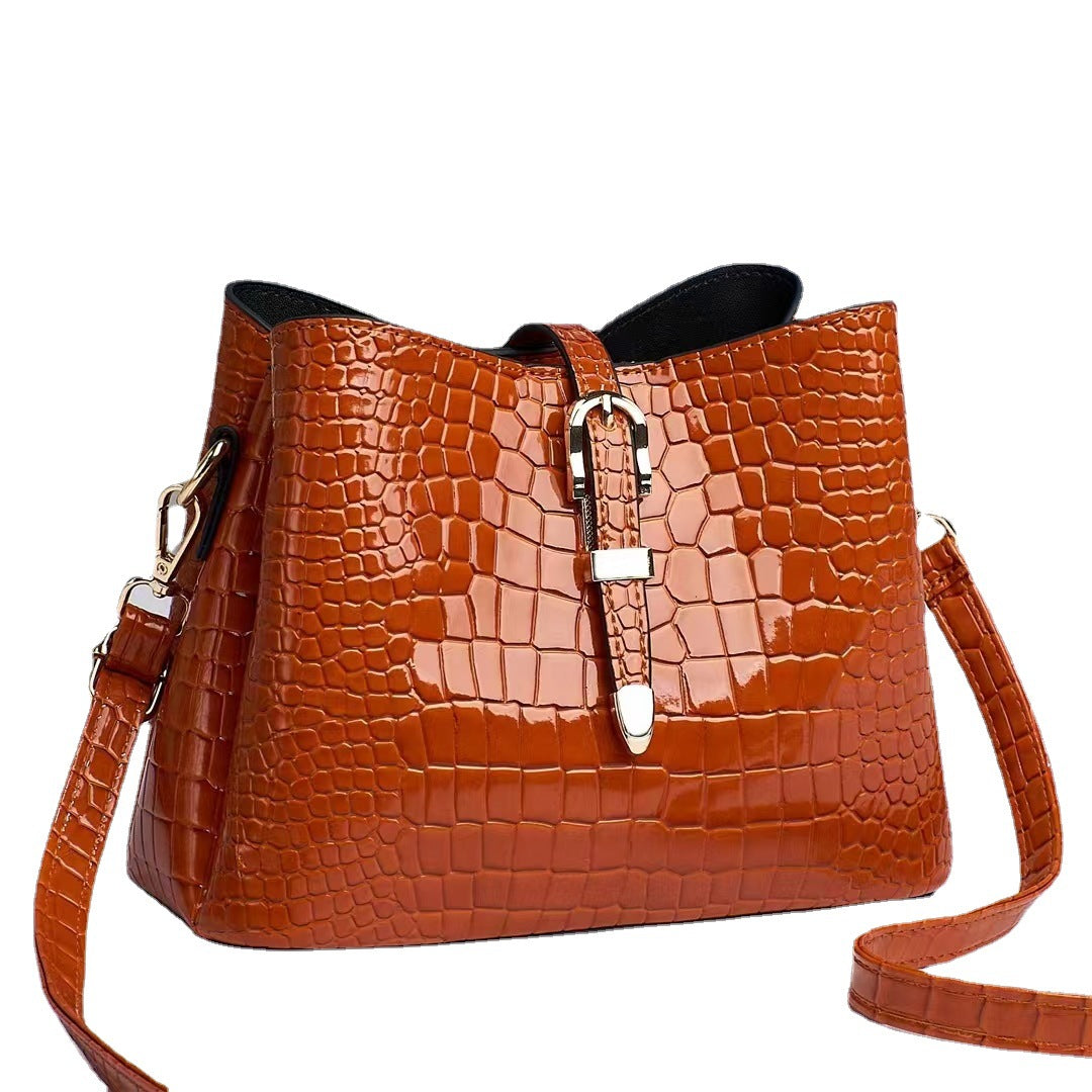 Factory bag 2022 new women's bag European and American cross-border trend texture bright leather stone pattern one-shoulder cross-body bucket bag 