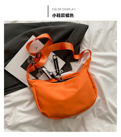 包包女2021新款秋冬潮韩版大容量斜挎包休闲轻便牛津布简约饺子包