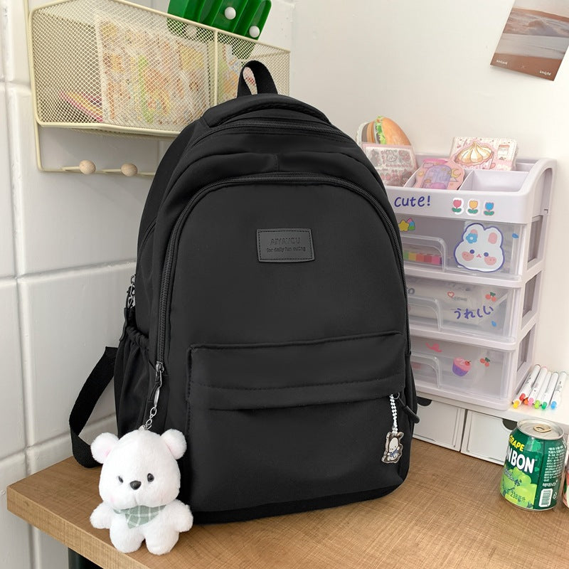 Solid color backpack for women 2023 new style middle school girl girl large capacity high school bag college girl simple backpack 