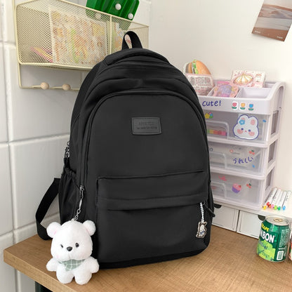 Solid color backpack for women 2023 new style middle school girl girl large capacity high school bag college girl simple backpack 